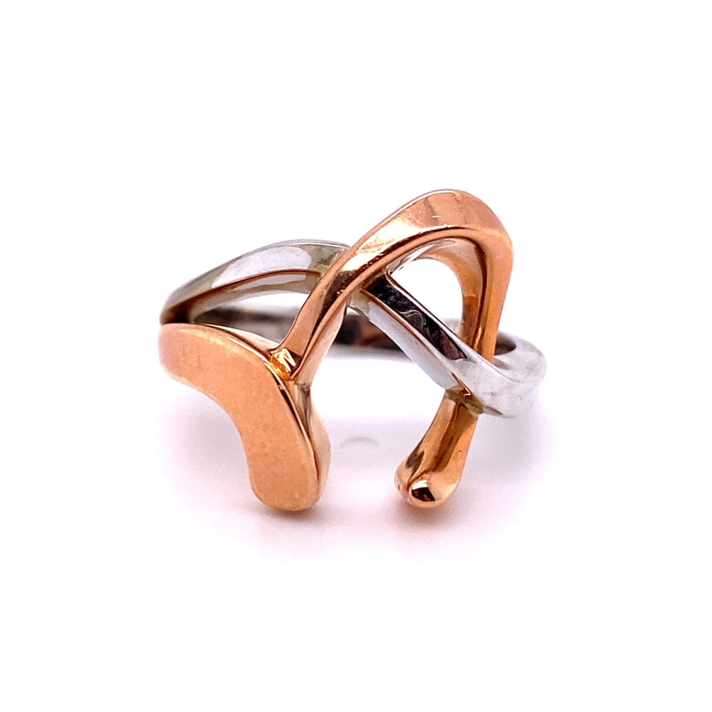 two tone gold and silver ring on a white background