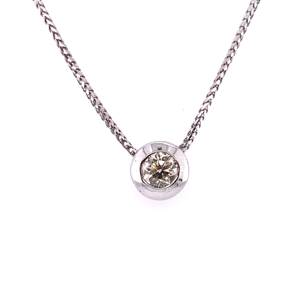 a diamond pendant is shown on a chain