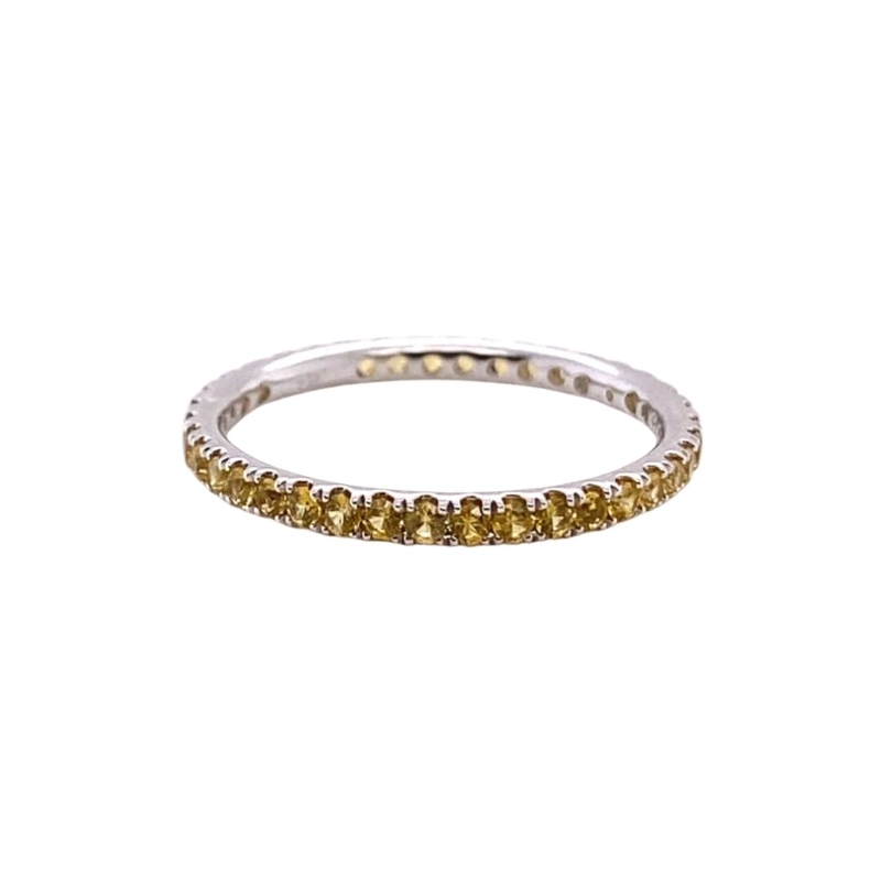a yellow diamond ring on a white background