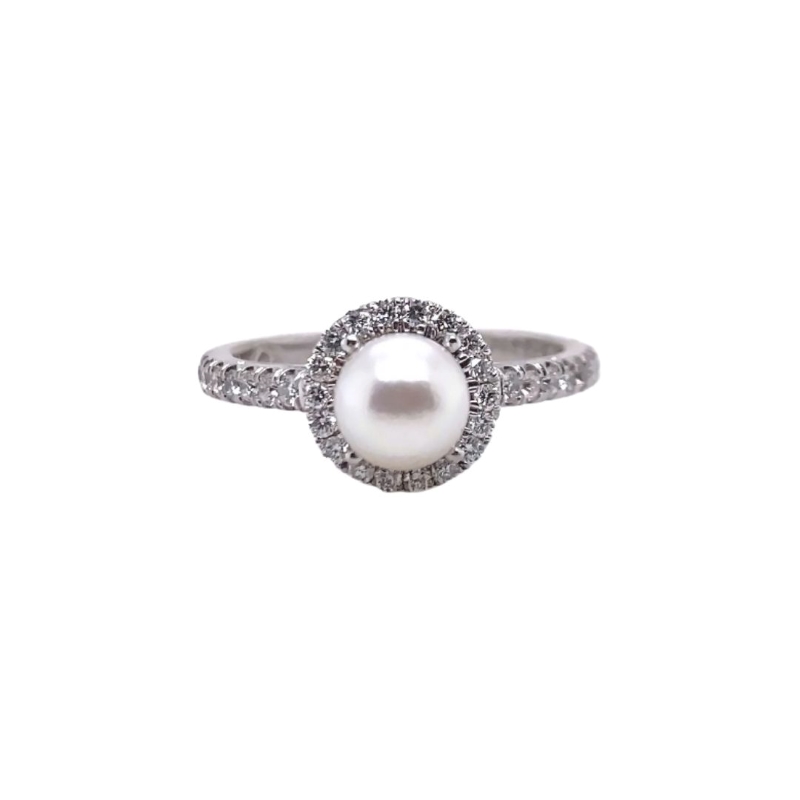 a white pearl and diamond ring