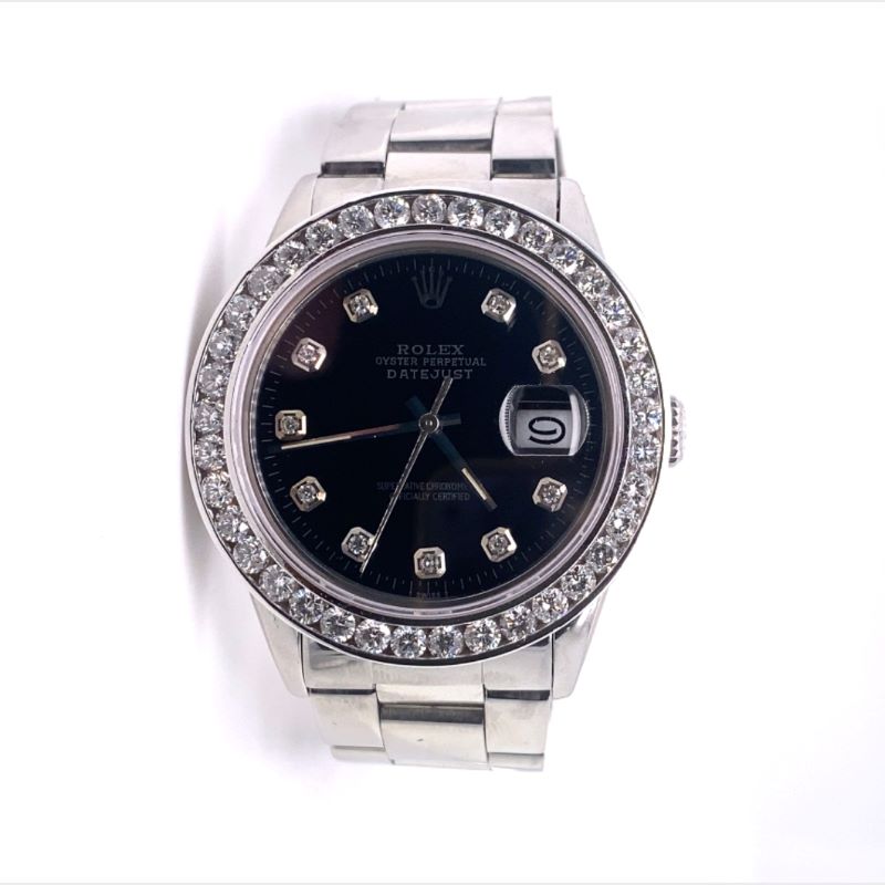a rolex watch with black dial and diamonds