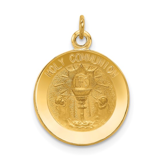 a gold medal with the words holy community on it