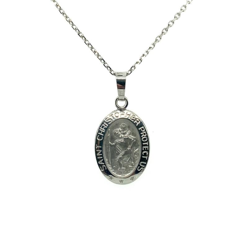 a silver necklace with an image of a woman on it