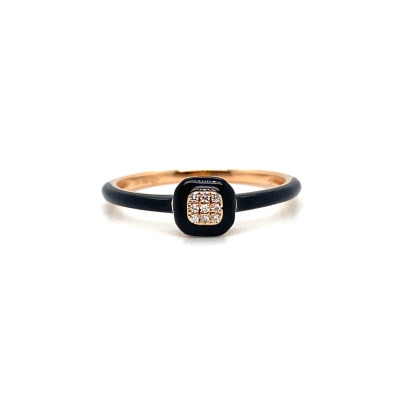 a black and gold ring with diamonds on it