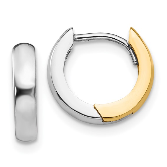 a pair of hoop earrings with two tone gold accents