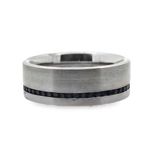 a white gold ring with black diamonds