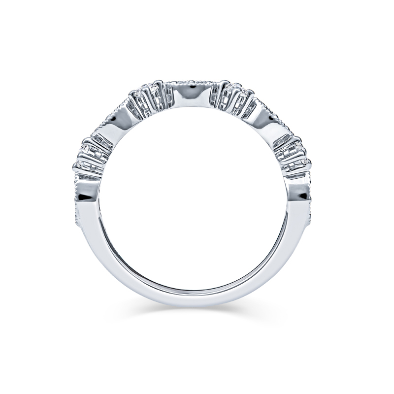 a white gold ring with three rows of diamonds