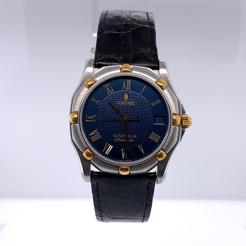 a watch with roman numerals and blue dial