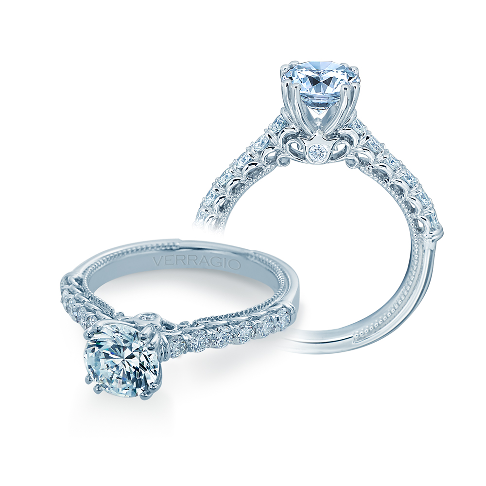 an engagement ring with a center stone and side stones