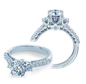 a diamond engagement ring with an intricate setting
