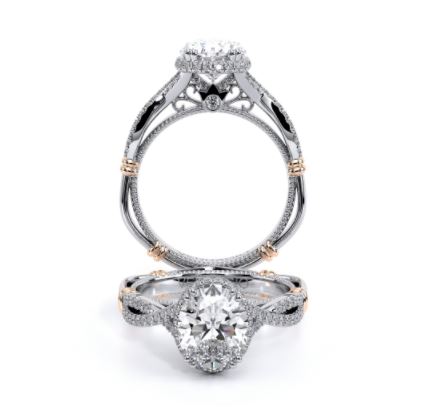 an engagement ring with two tone gold and white diamonds
