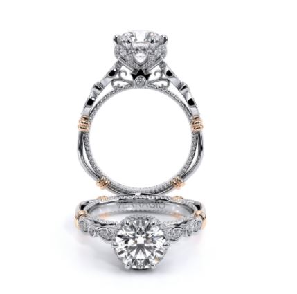 a diamond engagement ring with two tone gold accents