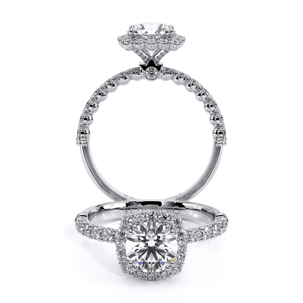 a diamond engagement ring with an intricate halo setting