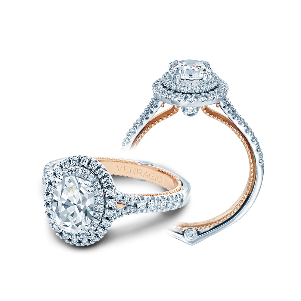 a diamond ring with two diamonds on the side