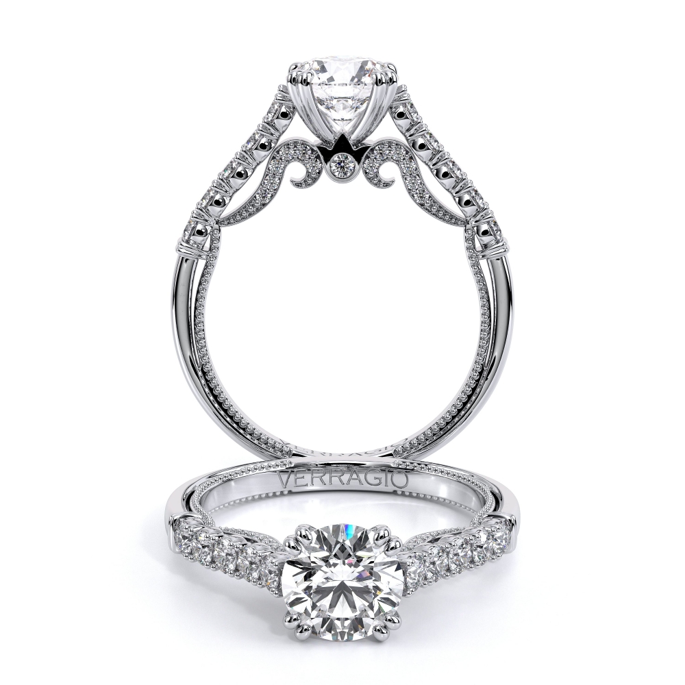 a diamond engagement ring with an intricate band
