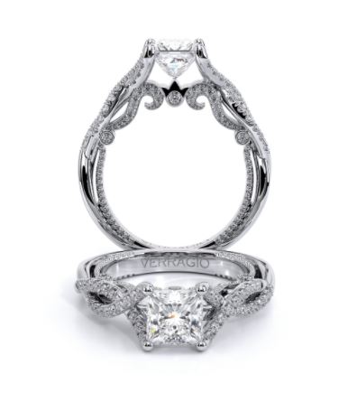 a princess cut diamond engagement ring with an intricate band
