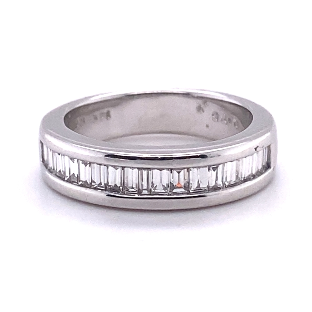 a white gold band with baguetts of diamonds