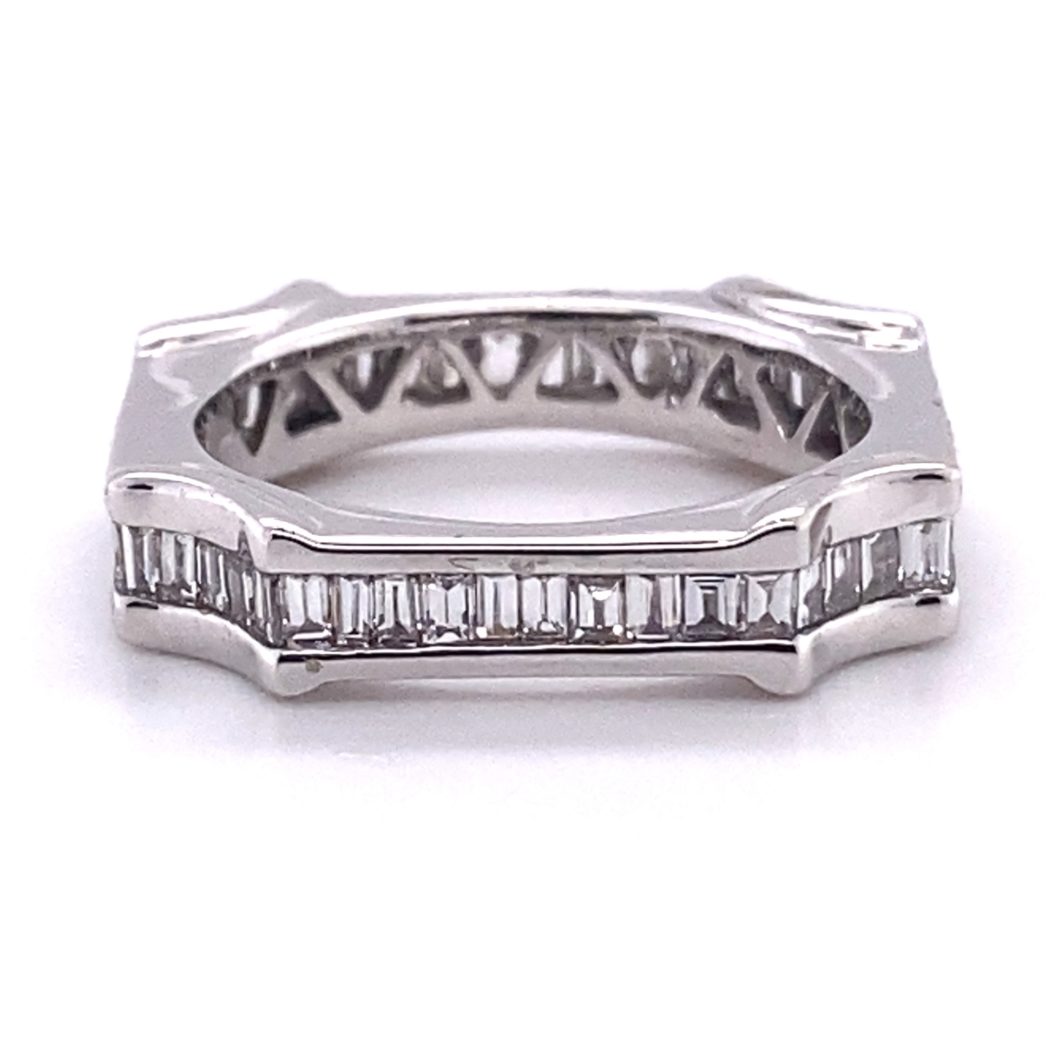 a white gold wedding band with baguetts