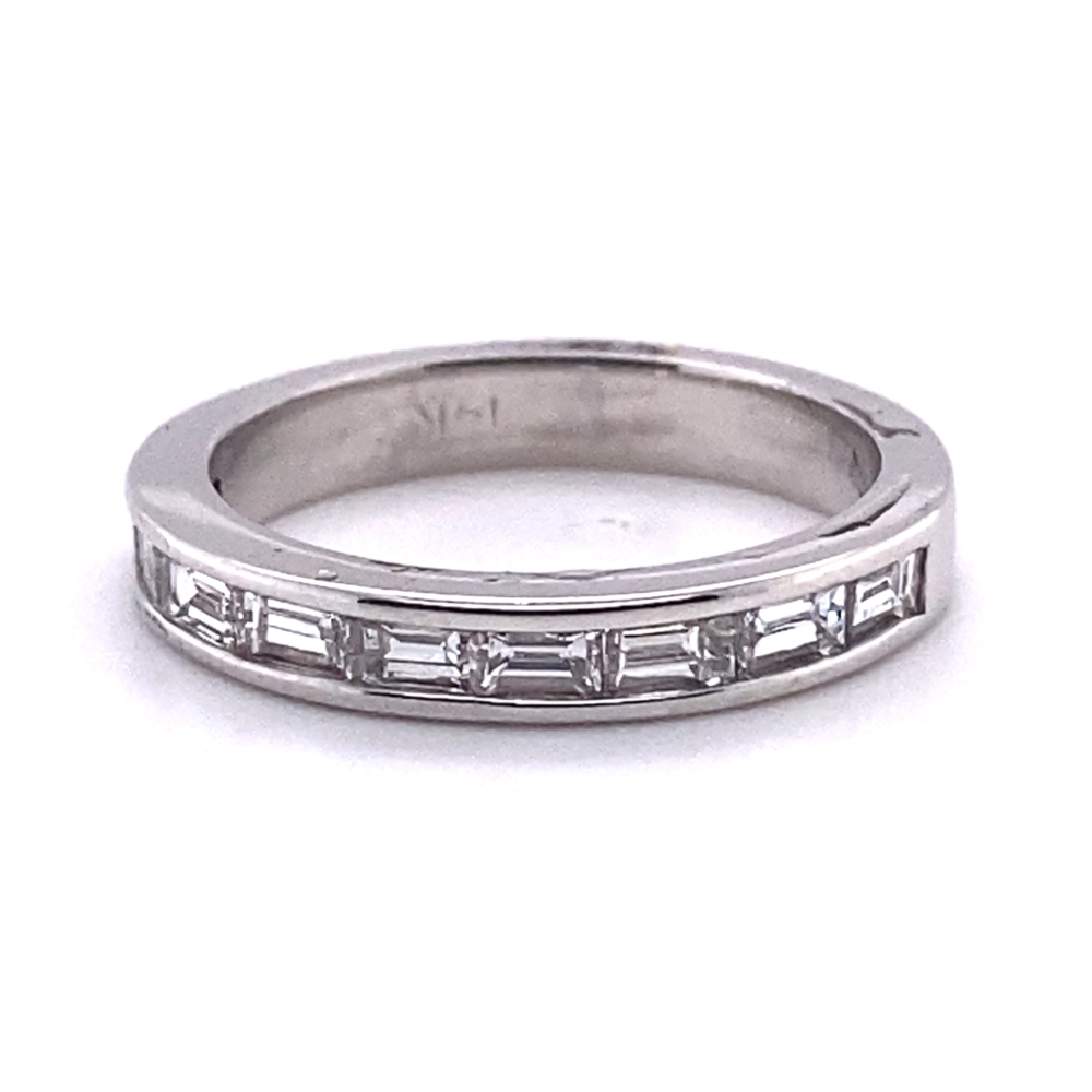a white gold wedding band with baguettes