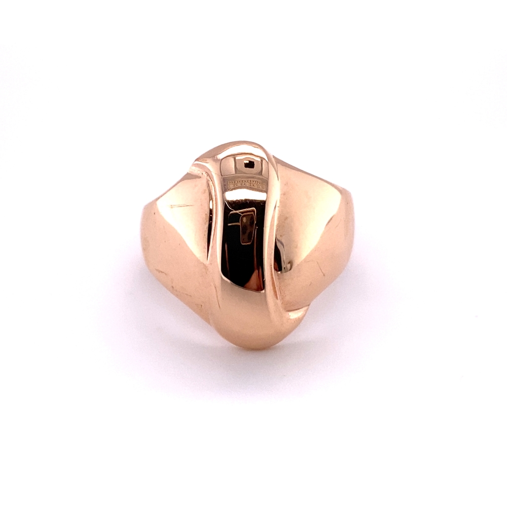 a gold signet ring on a white background