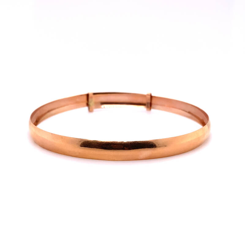 a thin gold bracelet with a square clasp