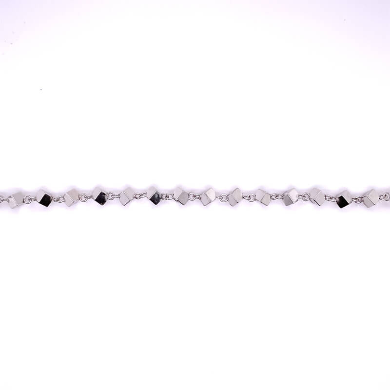 a white background with a silver chain on it