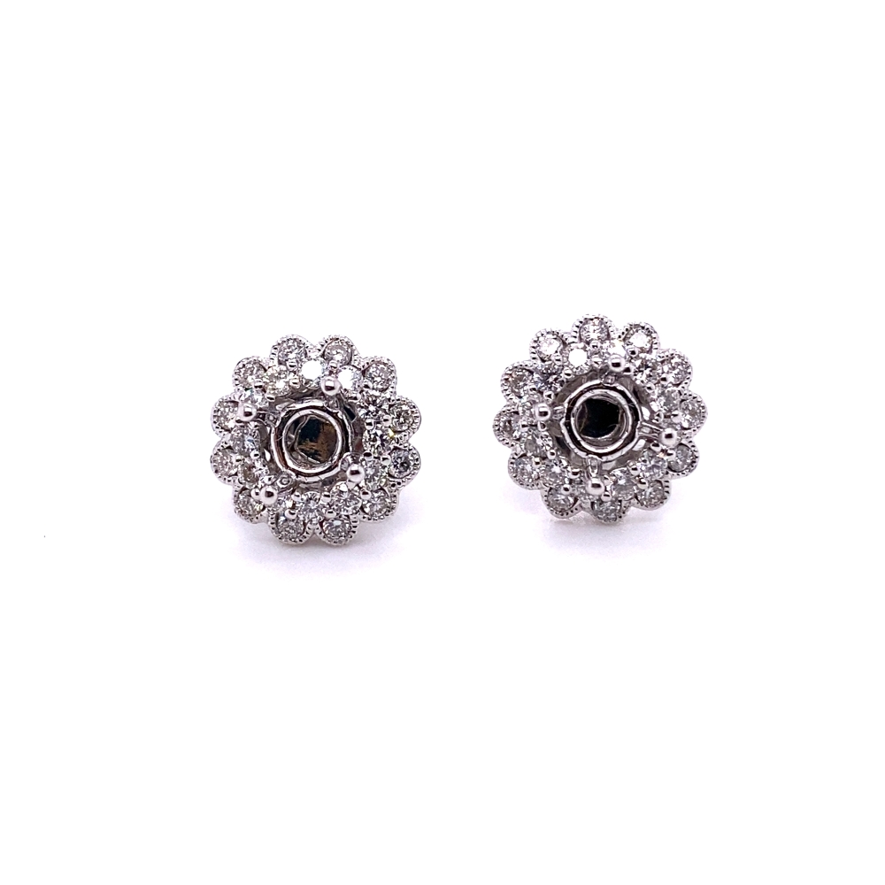 pair of earrings with black and white stones