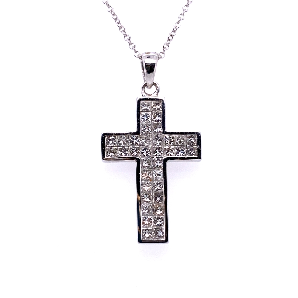 a cross necklace with white diamonds on it