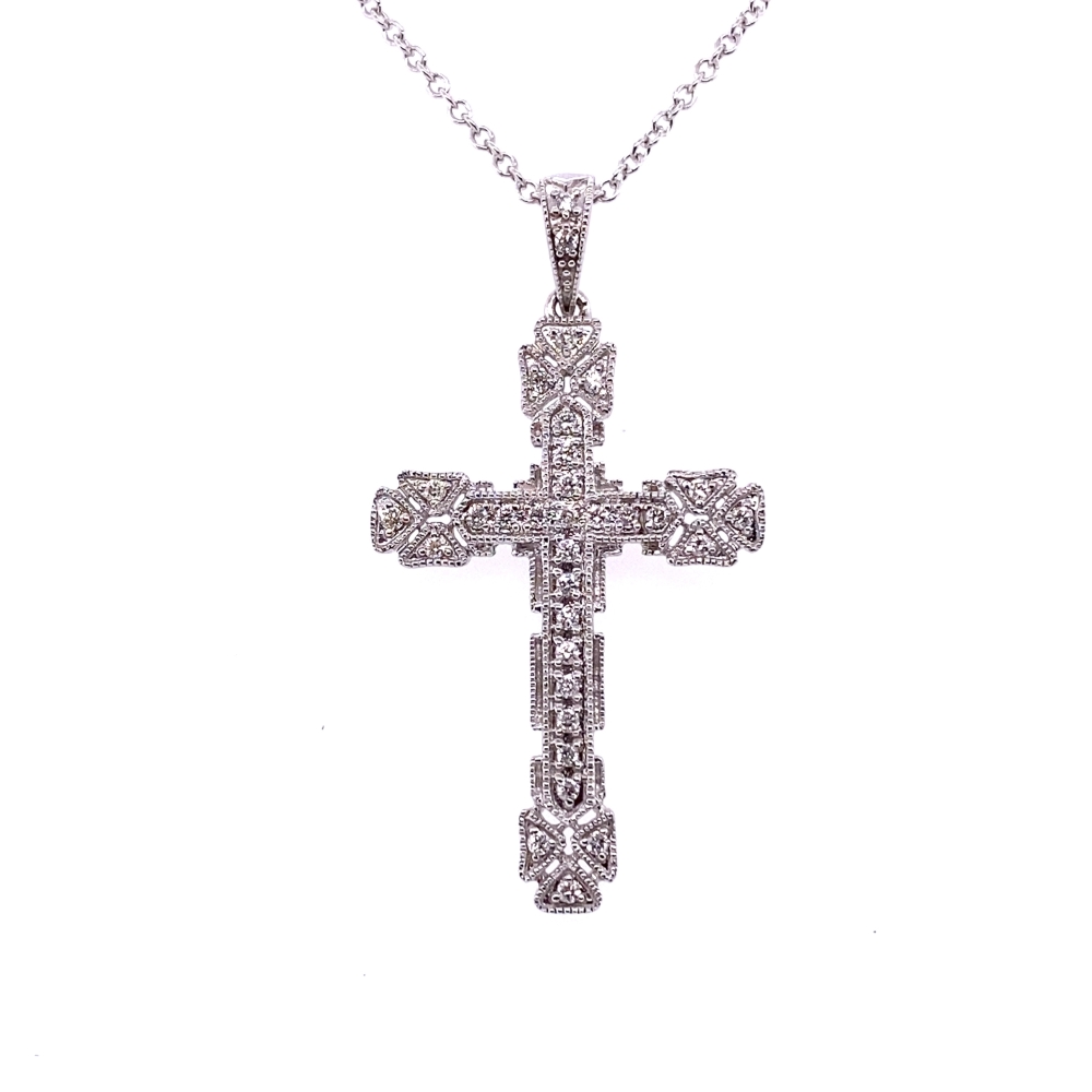 a cross pendant with diamonds on it