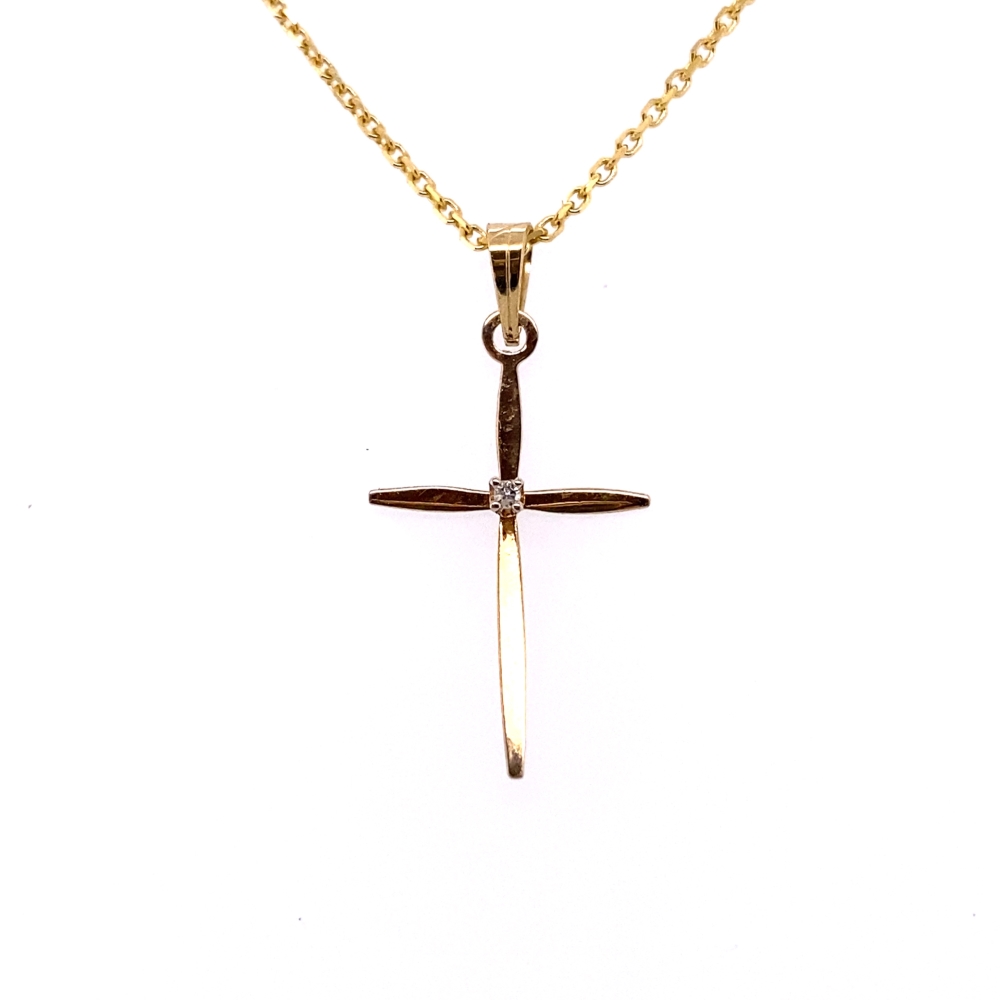 a gold cross necklace with a diamond on it