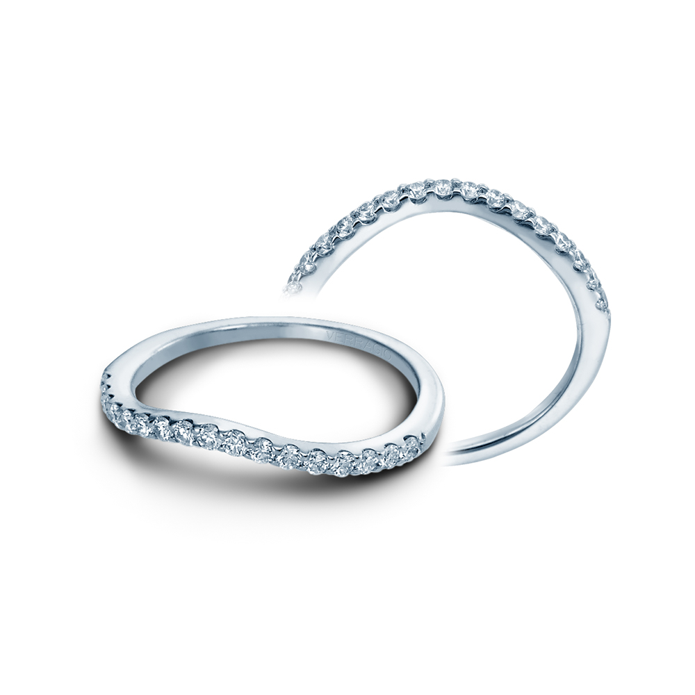 a white gold wedding band with diamonds on it