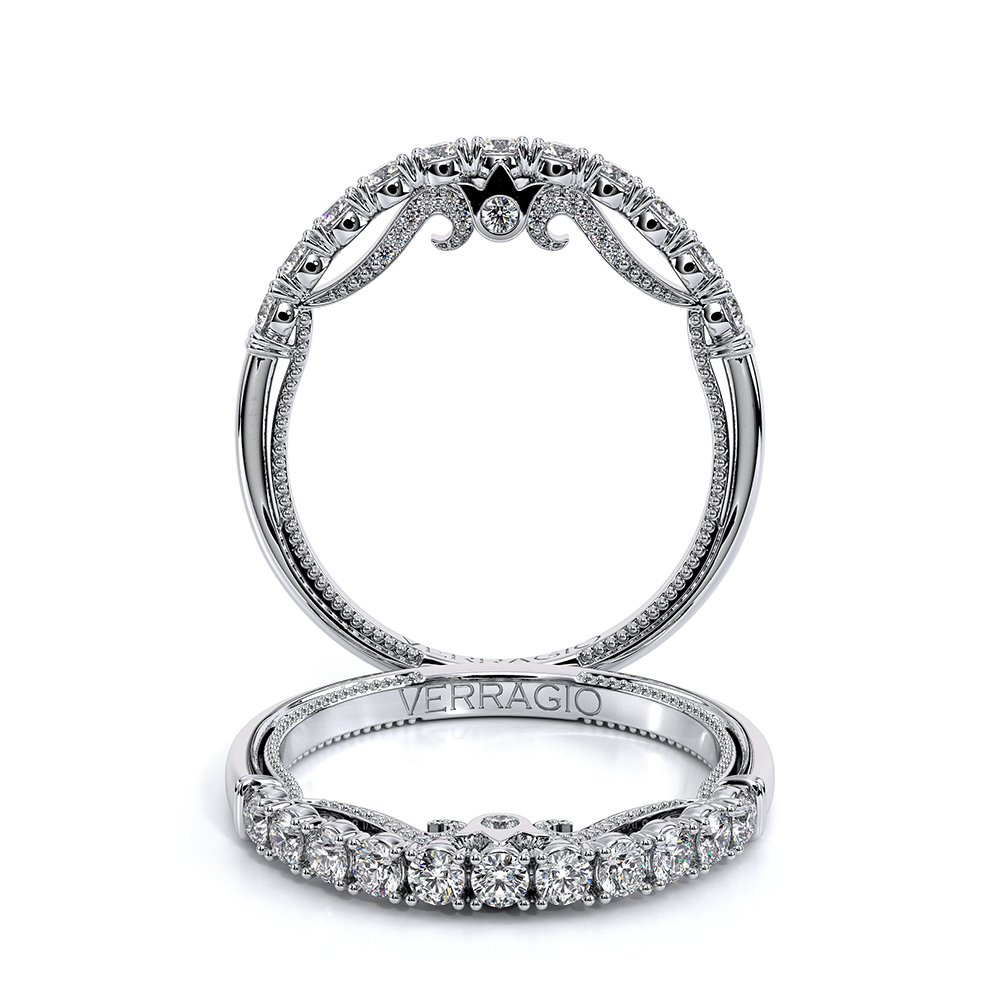 a wedding ring with three diamonds on it