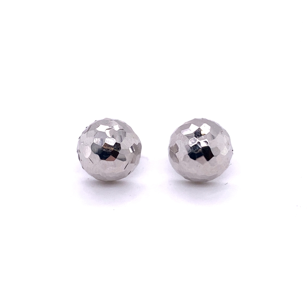 two silver balls sitting on top of each other