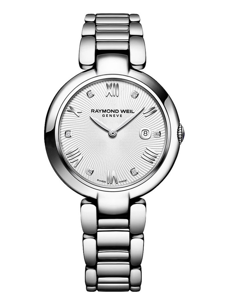 a women's watch with a white dial