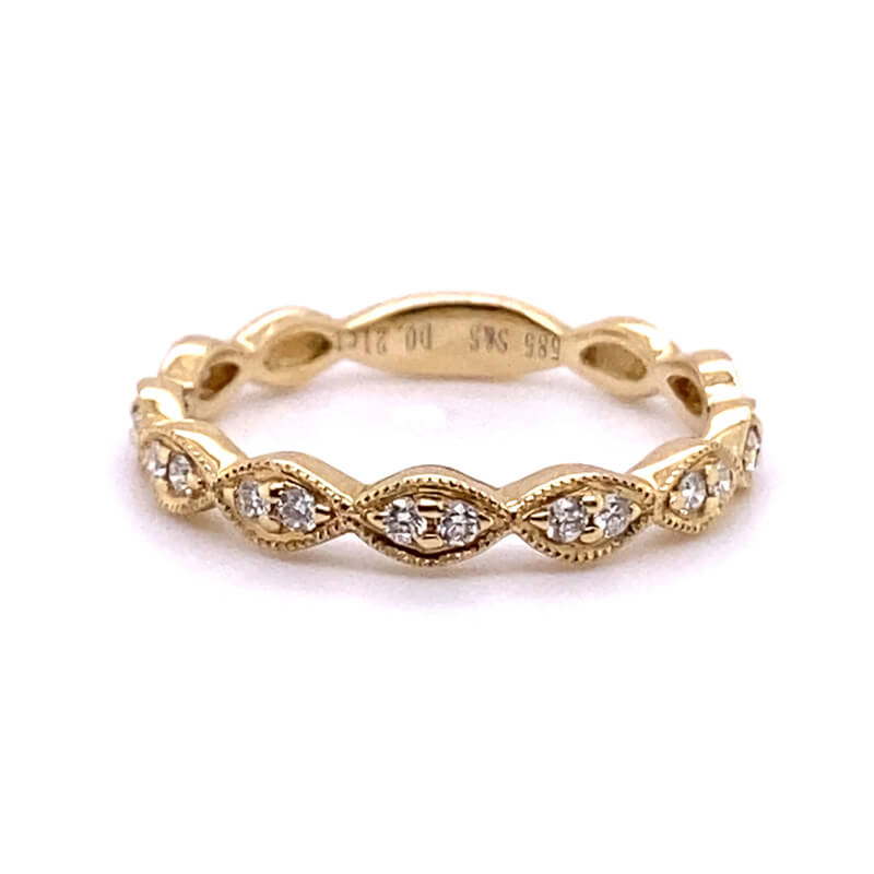 a gold ring with diamonds on it