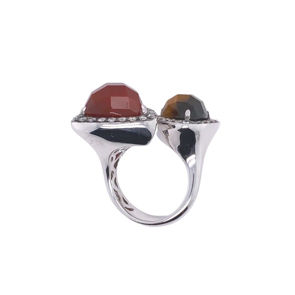 two rings with different colored stones on them