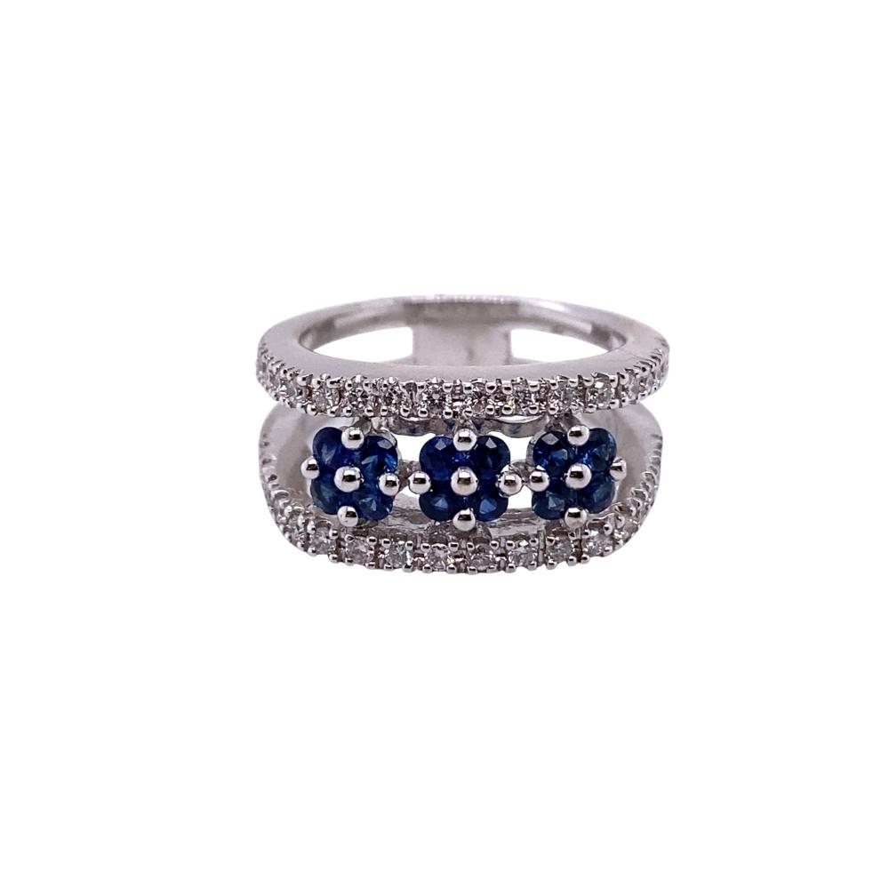 a white gold ring with blue and white diamonds