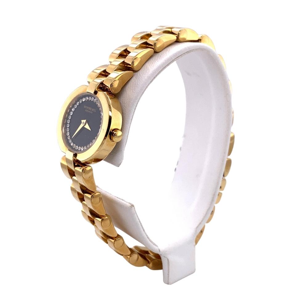 a gold and white watch on a white background