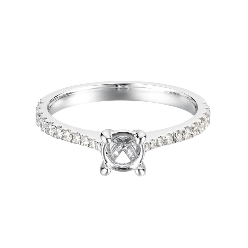 a white gold ring with a diamond set in the middle
