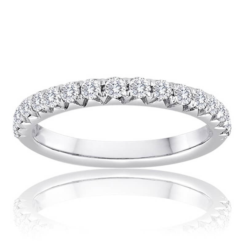 a wedding ring with five diamonds on the side