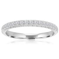 a white gold wedding band with rows of diamonds