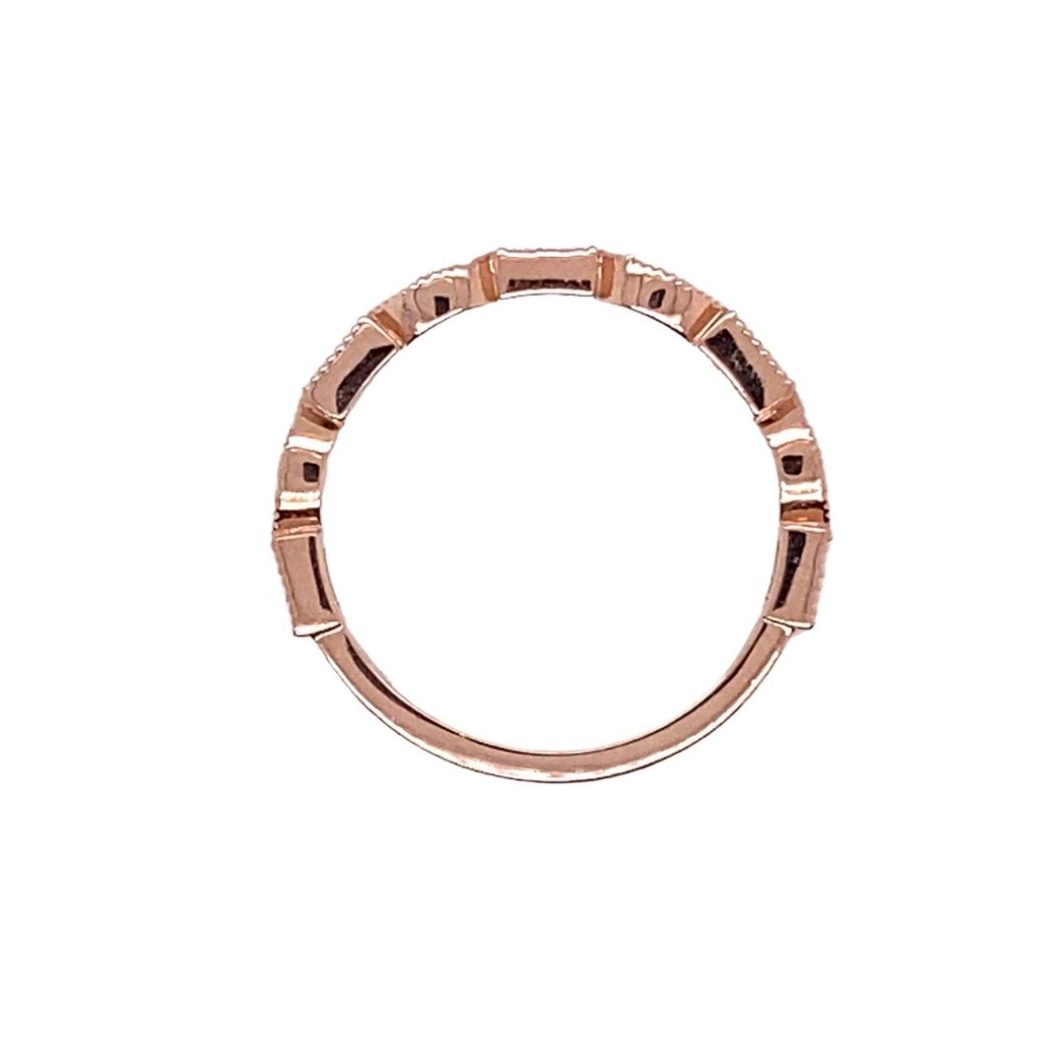 a rose gold ring with small diamonds