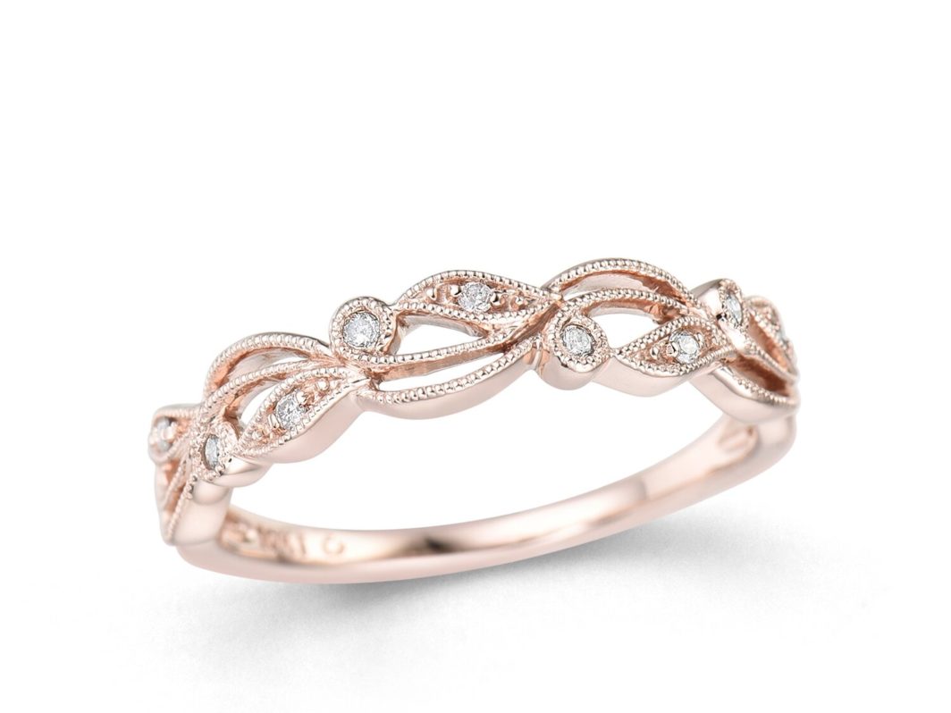 a rose gold ring with diamonds