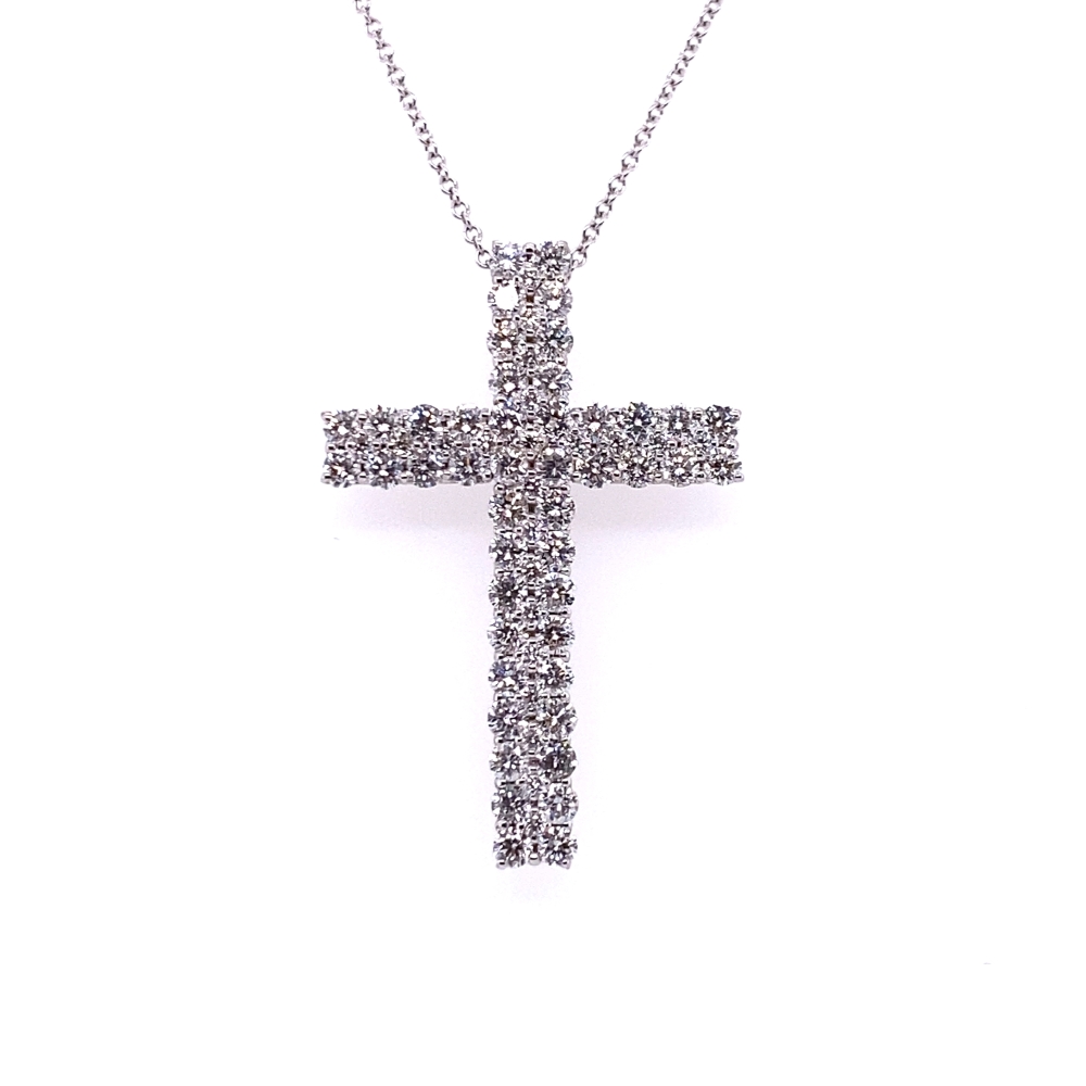 a large cross pendant is shown on a chain