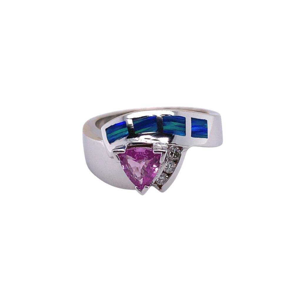 a white gold ring with blue and pink stones