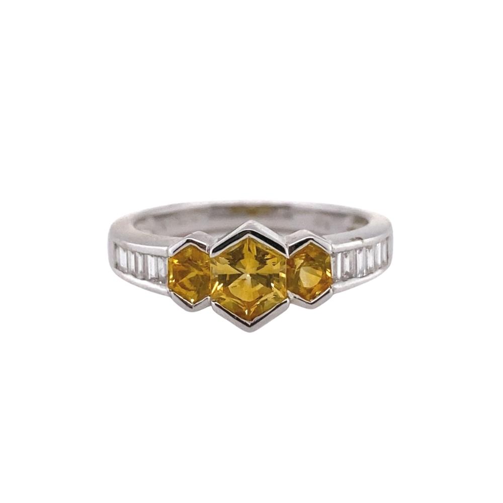a yellow sapphire and diamond ring