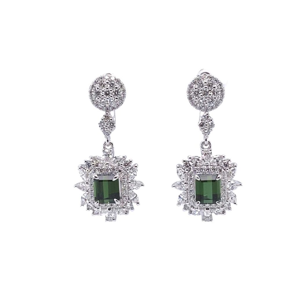 a pair of green and white earrings