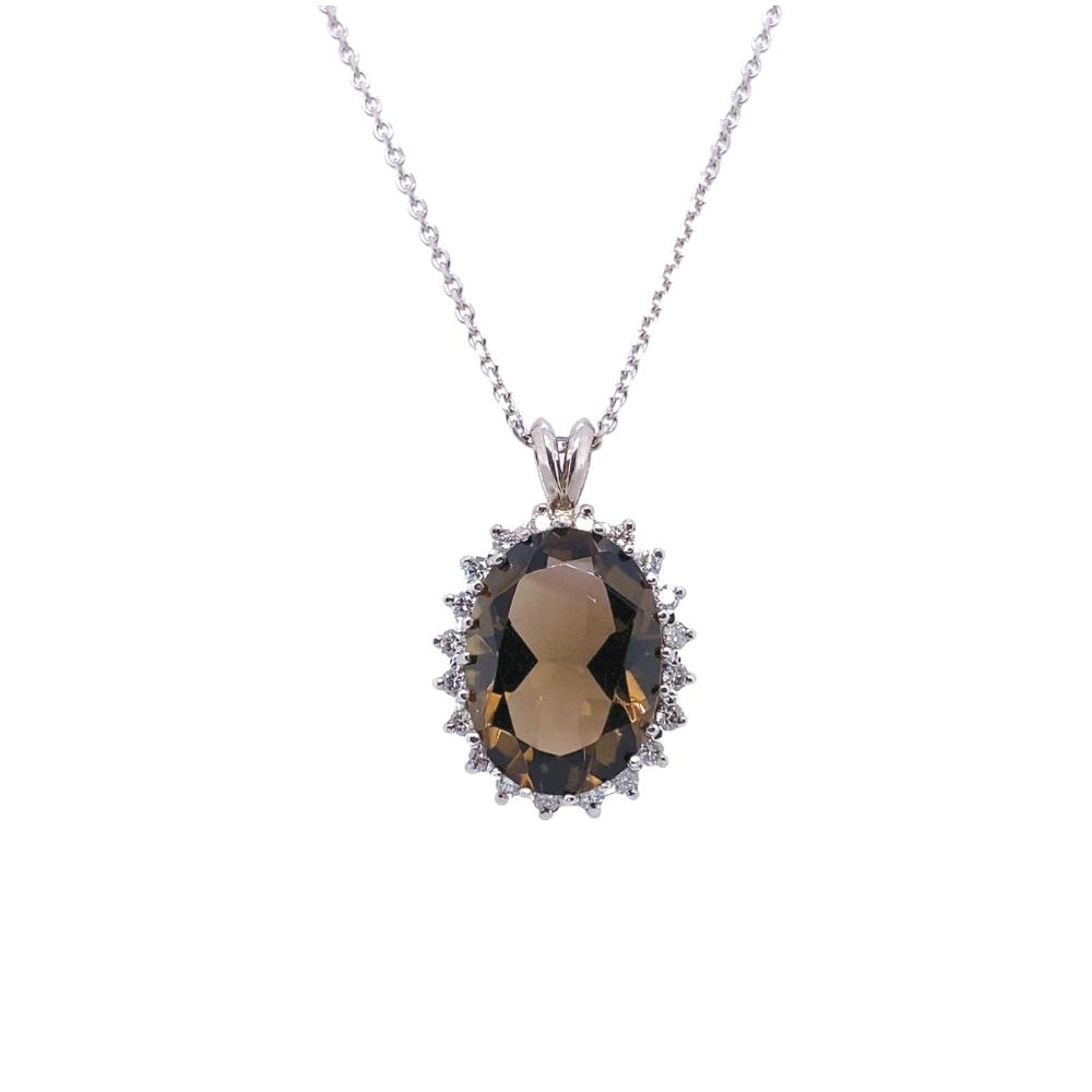 a necklace with an oval shaped stone and diamonds
