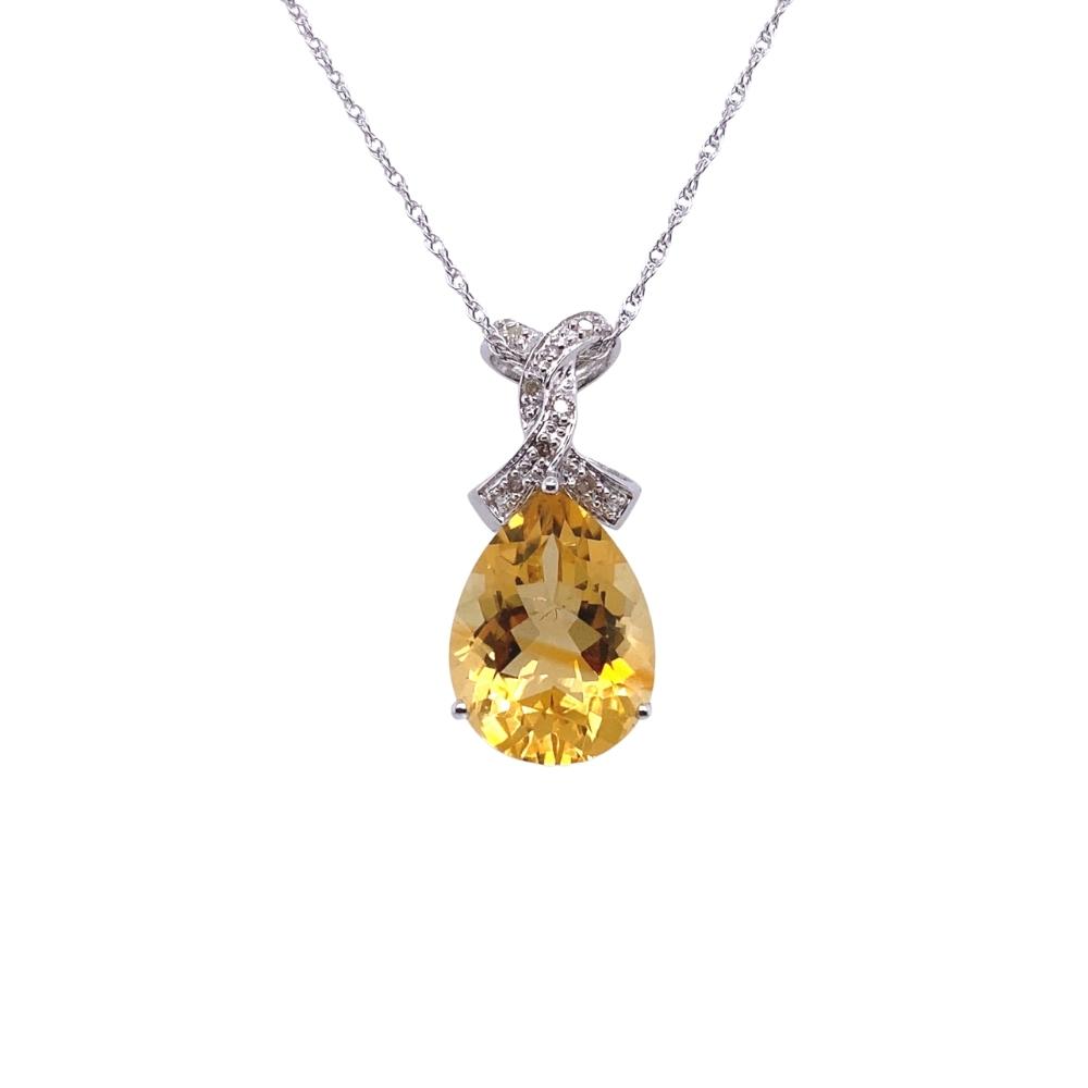 a yellow and white necklace with an oval shaped pendant