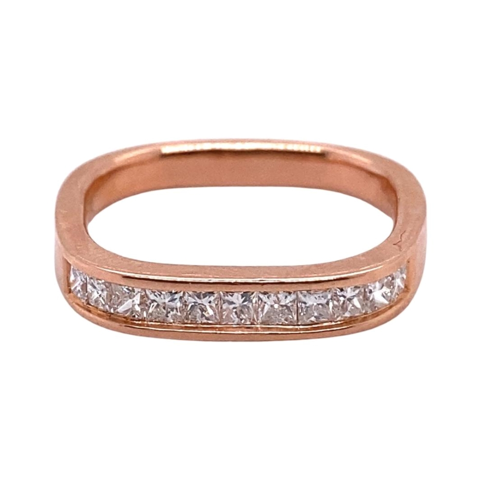 a rose gold ring with princess cut diamonds